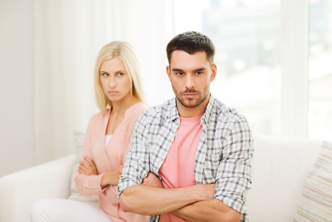 Unhappy Couple Having Argument at Home